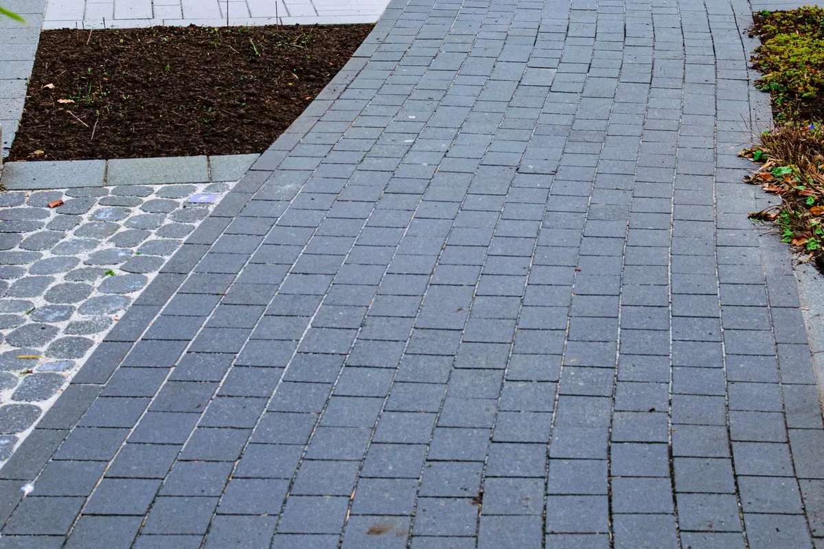 Paver driveway with a clean, sealed finish